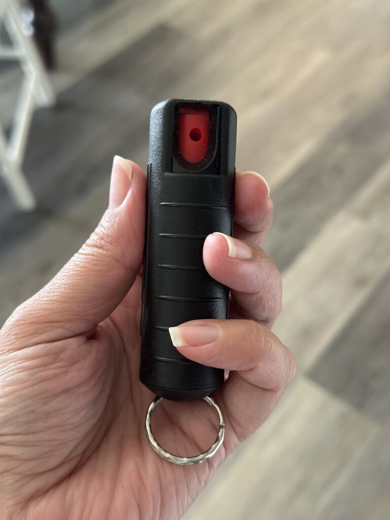 Photo of a self-defense keychain of pepper spray